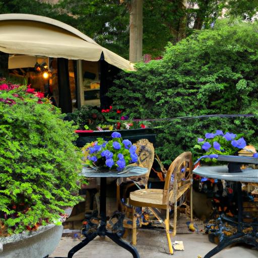 Quán cafe độc đáo với không gian ngoài trời xanh mát, bao quanh bởi cây xanh và hoa đẹp.